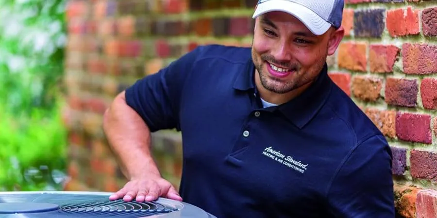 american standard tech looking at ac unit